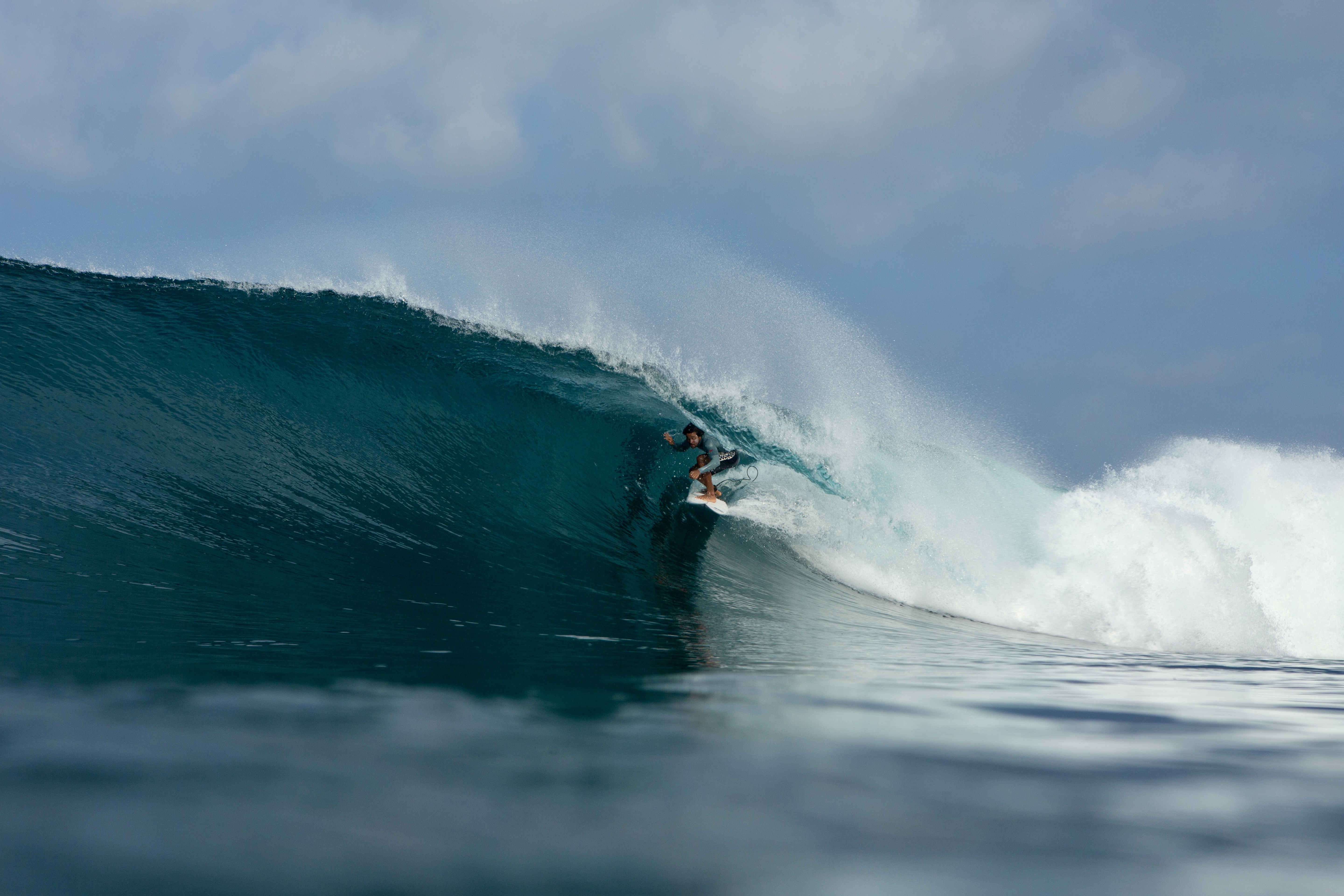 Matheus surfing inside a wave